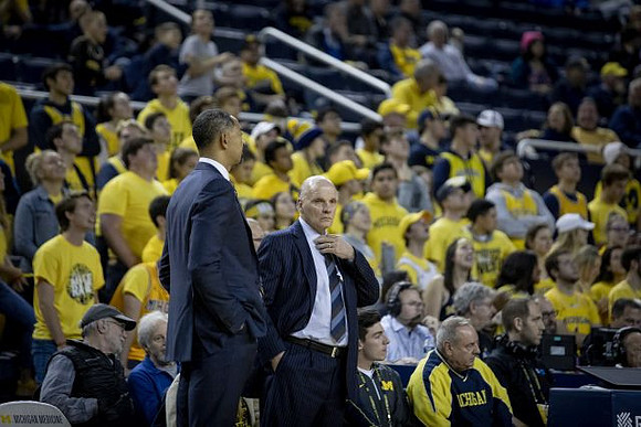 Juwan Howard and Phil Martelli