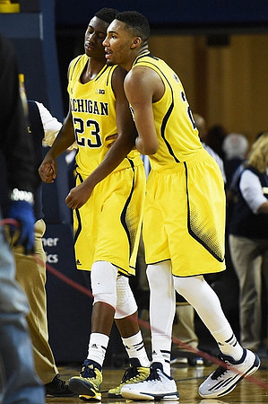 Caris LeVert (23) and Zak Irvin (21)