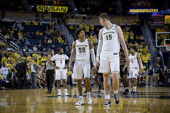 Zavier Simpson (3), Eli Brooks (55), Jon Teske (15), and David DeJulius (0)
