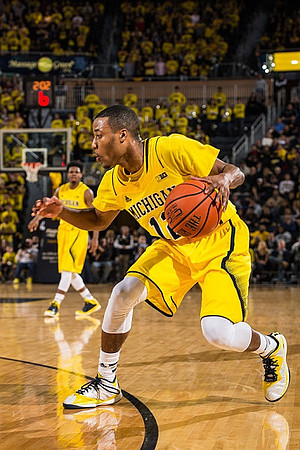 Derrick Walton Jr. (10) and Muhammad-Ali Abdur-Rahkman (12)