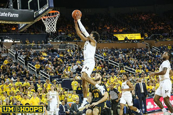 Colin Castleton (11), Eli Brooks (55), David DeJulius (0), and Zavier Simpson (3)