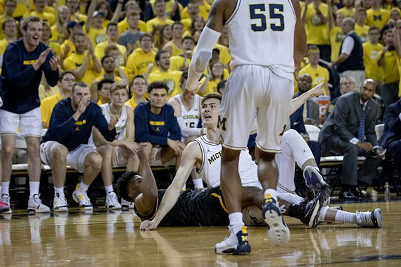 Eli Brooks (55) and Colin Castleton (11)