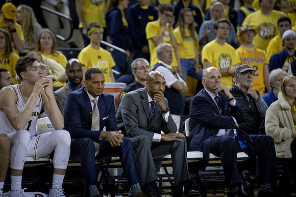 Colin Castleton (11), Howard Eisley, Saddi Washington, and Phil Martelli