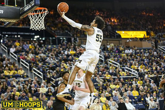 Eli Brooks (55) and Jon Teske (15)