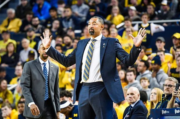 Saddi Washington, Juwan Howard, and Phil Martelli