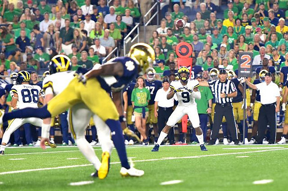 Donovan Peoples-Jones (9) and Grant Perry (88)