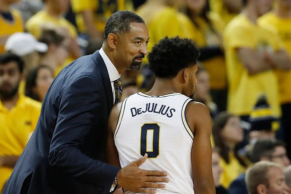 Juwan Howard and David DeJulius (0)