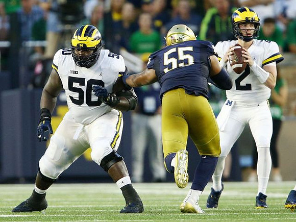 Michael Onwenu (50) and Shea Patterson (2)