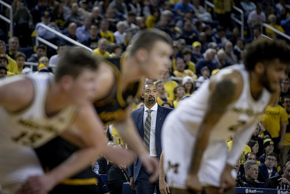 Jon Teske (15), Juwan Howard, and Isaiah Livers (2)