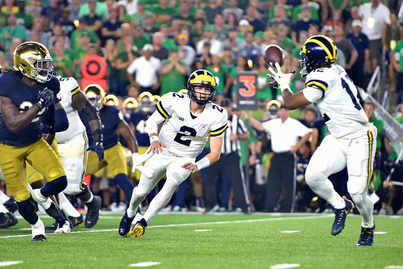 Shea Patterson (2) and Chris Evans (12)