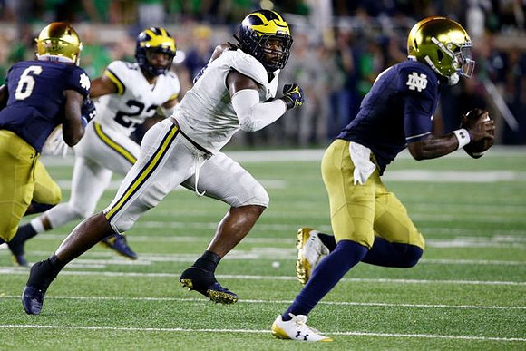 Tyree Kinnel (23) and Rashan Gary (3)