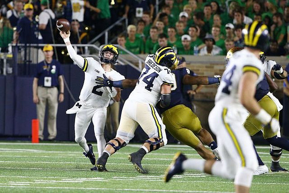 Shea Patterson (2), Ben Bredeson (74), and Sean McKeon (84)
