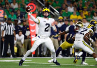 Shea Patterson (2) and Karan Higdon (22)