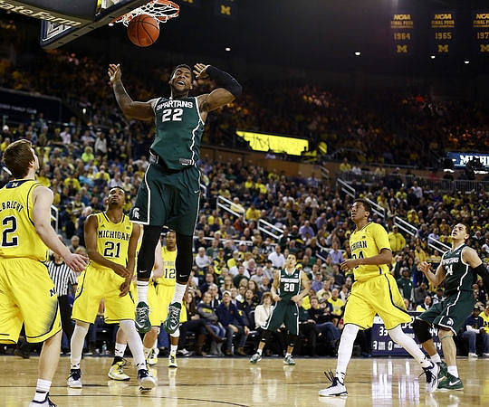 Spike Albrecht (2), Zak Irvin (21), Muhammad-Ali Abdur-Rahkman (12), and Aubrey Dawkins (24)
