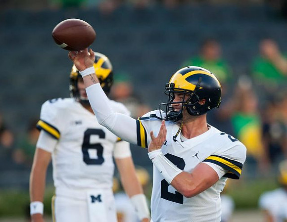Michael Sessa (6) and Shea Patterson (2)