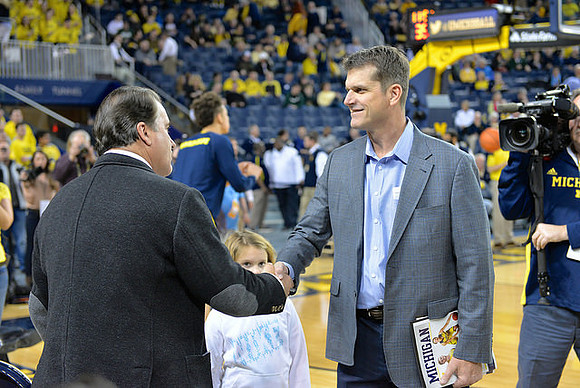 Steve Mariucci  and Jim Harbaugh