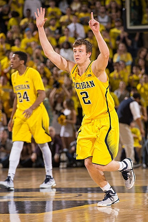 Aubrey Dawkins (24) and Spike Albrecht (2)