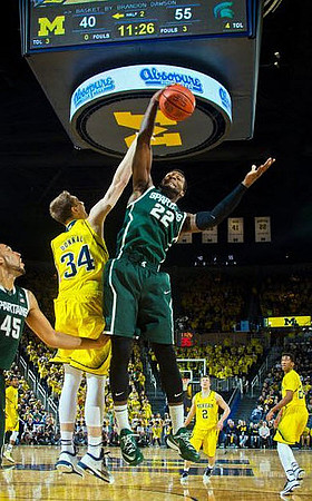 Muhammad-Ali Abdur-Rahkman (12), Mark Donnal (34), Spike Albrecht (2), and Aubrey Dawkins (24)