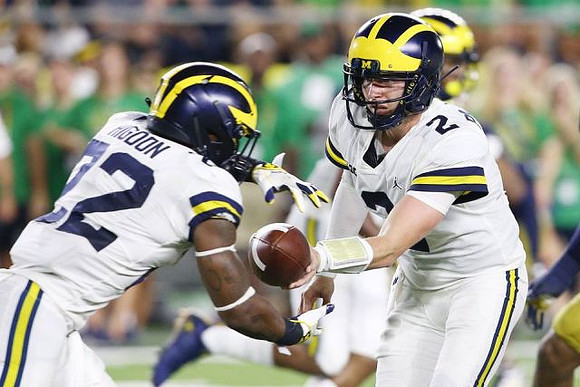 Karan Higdon (22) and Shea Patterson (2)