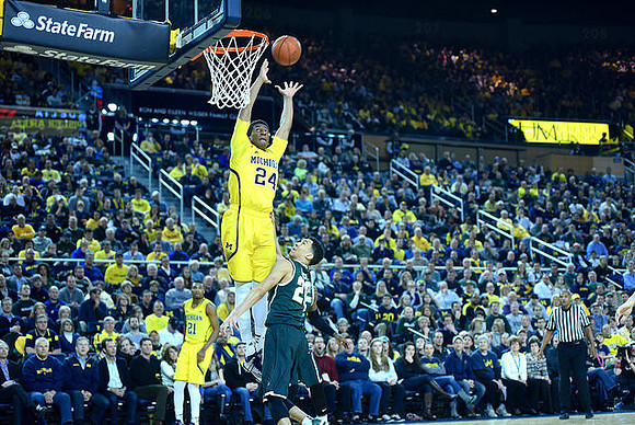 Zak Irvin (21) and Aubrey Dawkins (24)