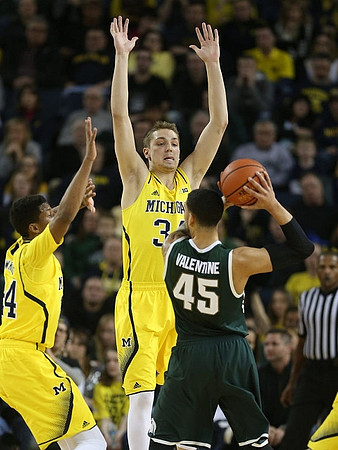 Aubrey Dawkins (24) and Mark Donnal (34)