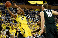 Muhammad-Ali Abdur-Rahkman (12) and Zak Irvin (21)