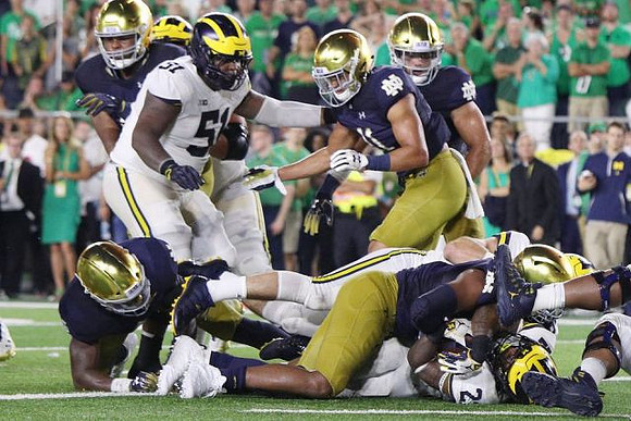 Cesar Ruiz (51) and Shea Patterson (2)