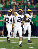 Lavert Hill (24), Brandon Watson (28), and Brad Hawkins (20)