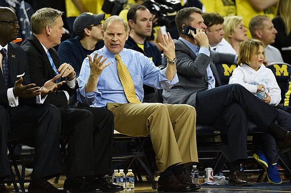 Bacari Alexander, Jeff Meyer, John Beilein, and Jim Harbaugh