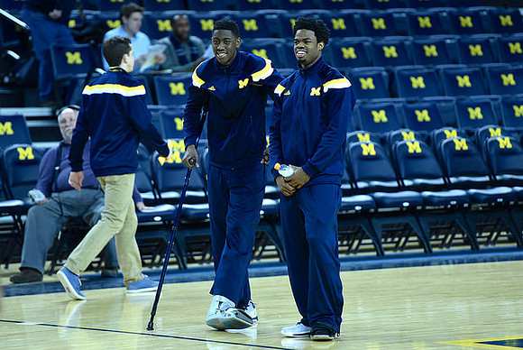 Caris LeVert (23) and Derrick Walton Jr. (10)