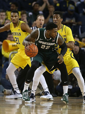 Zak Irvin (21) and Aubrey Dawkins (24)