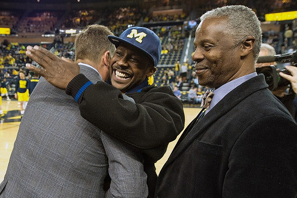 Jim Harbaugh and Desmond Howard