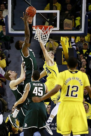 Mark Donnal (34) and Muhammad-Ali Abdur-Rahkman (12)