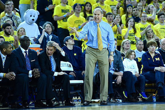 LaVall Jordan, Bacari Alexander, Jeff Meyer, and John Beilein