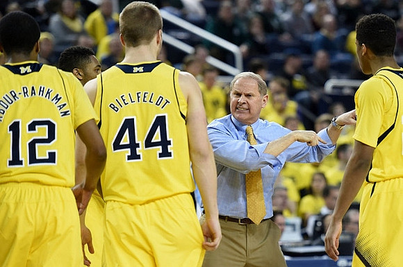 Muhammad-Ali Abdur-Rahkman (12), Max Bielfeldt (44), John Beilein, and Muhammad-Ali Abdur-Rahkman (12)