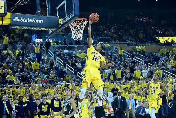 Muhammad-Ali Abdur-Rahkman (12) and Zak Irvin (21)