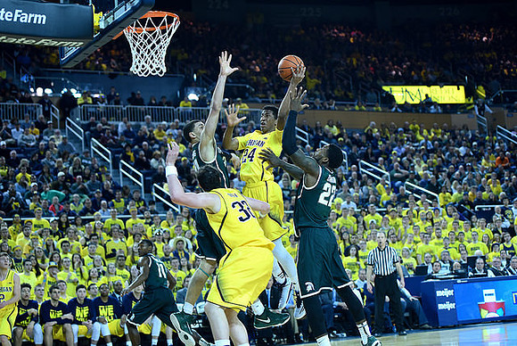 Spike Albrecht (2), Ricky Doyle (32), and Aubrey Dawkins (24)