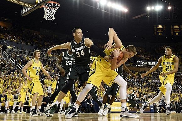 Ricky Doyle (32), Spike Albrecht (2), Mark Donnal (34), and Zak Irvin (21)