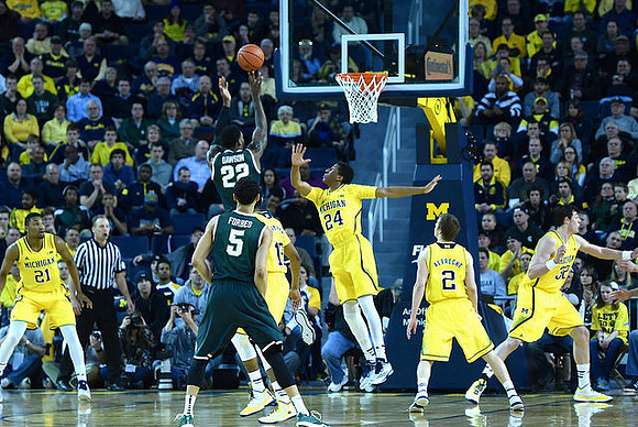 Zak Irvin (21), Muhammad-Ali Abdur-Rahkman (12), Aubrey Dawkins (24), Spike Albrecht (2), and Ricky Doyle (32)