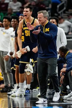 Dusty May and Michigan Team