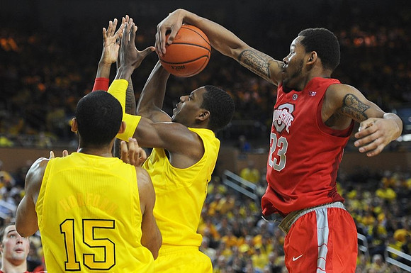 Jon Horford (15) and Glenn Robinson III (1)