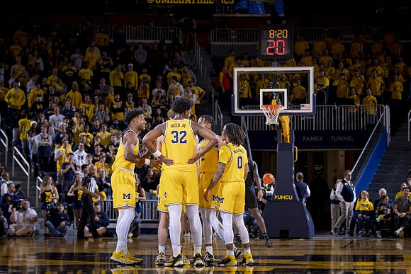 Jace Howard (25), Tarris Reed Jr. (32), Kobe Bufkin (2), and Dug McDaniel (0)