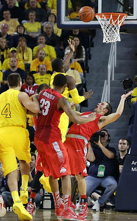 Mitch McGary (4) and Tim Hardaway Jr. (10)