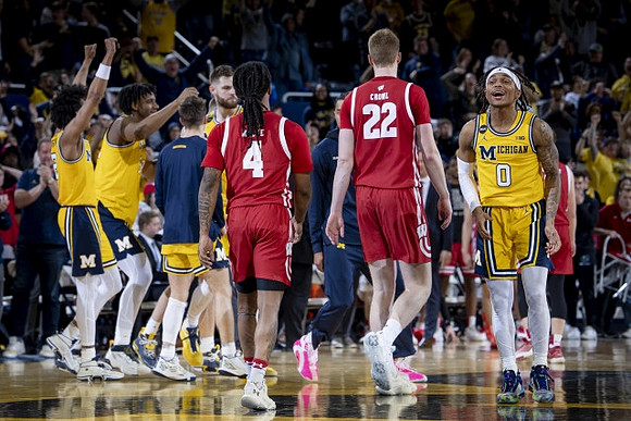 Kobe Bufkin (2), Tarris Reed Jr. (32), Hunter Dickinson (1), and Dug McDaniel (0)
