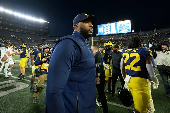 Sherrone Moore and Tavierre Dunlap (22)