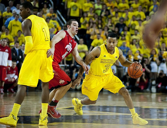 Glenn Robinson III (1) and Trey Burke (3)