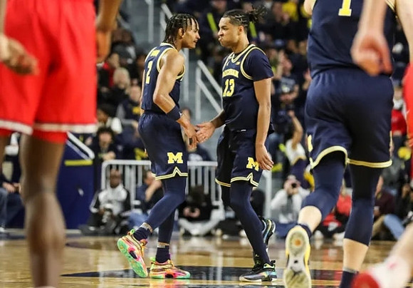 Kobe Bufkin (2) and Jett Howard (13)