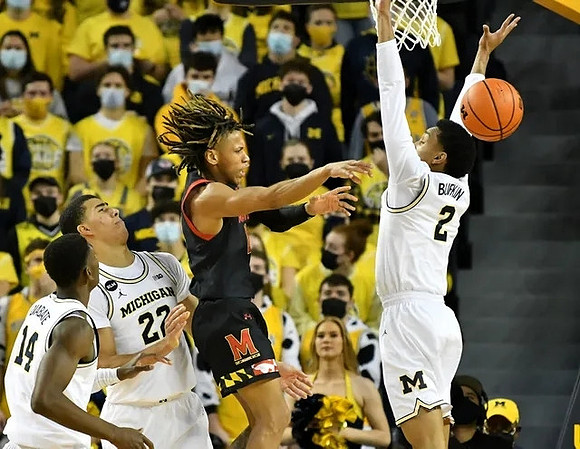 Moussa Diabate (14), Caleb Houstan (22), and Kobe Bufkin (2)