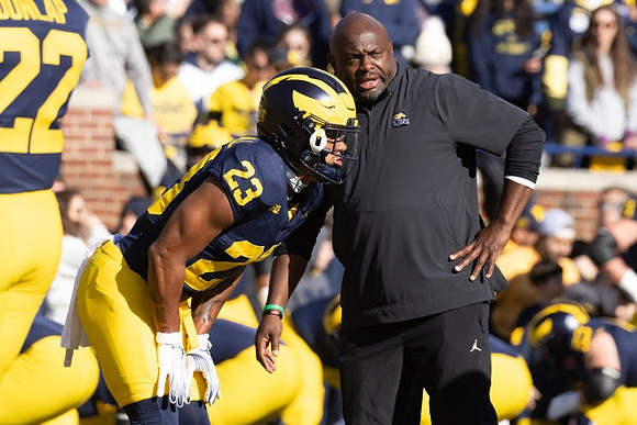Tavierre Dunlap (22), Jordan Marshall (23), and Tony Alford