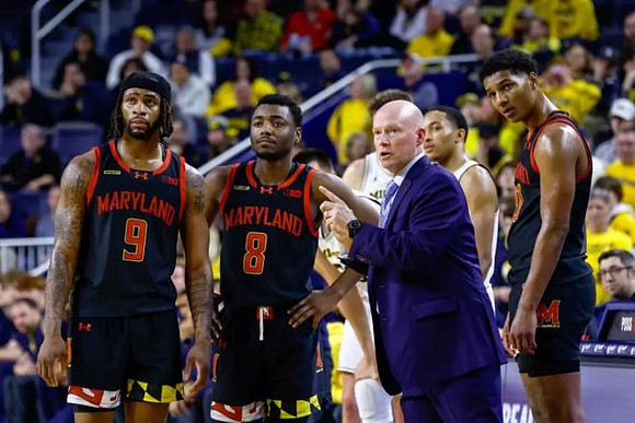 Maryland Head Coach Kevin Willard and Nimari Burnett (4)